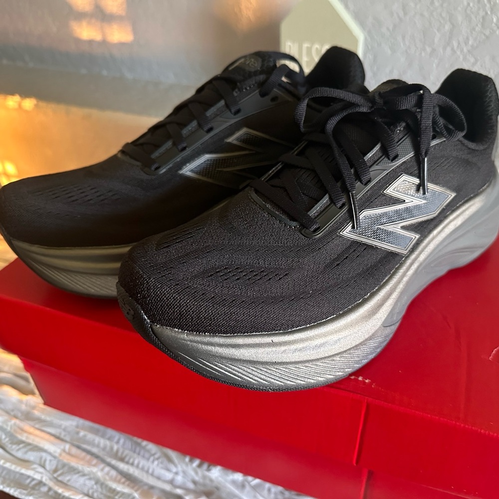 New Balance Black and Silver Sneakers